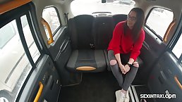 Brunette with glasses is sucking a rock hard dick in the back of a car