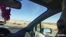 Stunning blonde woman is sucking dick in the car, while her partner is trying to drive