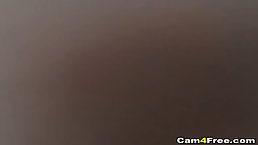 Passionate brunette doesn't mind playing with her pussy in front of the web camera, late at night