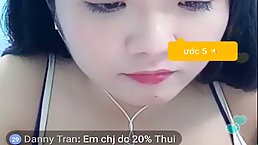 Asian brunette, Oanh is often hosting live shows on cam and displaying her impressive cleavage