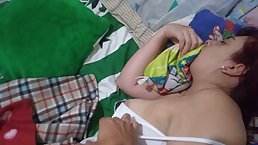 Big ass babe with tattoos and pierced nipples is sleeping while her roommate is touching her