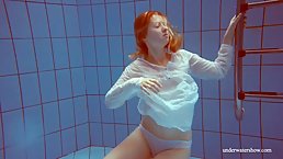 Red haired babe, Dashka is often swimming completely naked, not knowing that someone is watching her