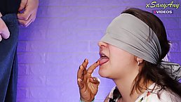 Blindfolded babe is about to play a tasting game, until she ends up sucking cock