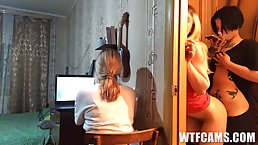 Blonde chick is watching porn while her roommate is having sex with her boyfriend, in the bedroom
