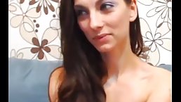 Small titted brunette is about to experience an orgasm in front of the web camera