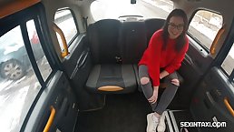 Cock loving brunette is giving a blowjob to a stranger in the back of a taxi