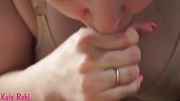 Adorable babe is gently sucking a thick dick and listening to her partner's moans and sighs