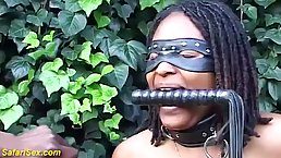 Big ass, African woman is about to get tied up and whipped in the nature