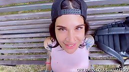 Tattooed brunette teen is giving blowjob to random muscular stranger in the middle of the day