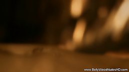 Seductive brunette puts oil all over her fuckable body and stimulates erect nipples on rough carpet