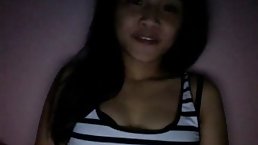 Ha Vy is charming VIetnamese teen who is striping he clothes and masturbate for the camera
