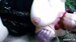 Red haired granny is rubbing her hairy pussy in the nature, before getting fucked hard