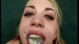 Slutty girls are kneeling on the floor, sucking many cocks and drinking loads of fresh cum