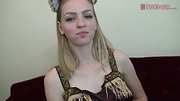 Blue- eyed blonde with braces is licking and eating gummy bears in a very sexy way