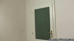 Slutty granny is wearing white stockings while having a threesome with guys from the neighborhood