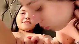 Sweet lesbian teens are pleasing each other on live cam in the middle of the day