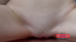 Blue- eyed brunette is having a shower and sucking dick, in front of the camera