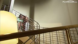 German brunette with big boobs is getting fucked on the staircase and moaning while cumming