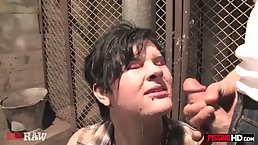 Short haired, amateur babe is sucking two cocks and getting golden showers, while on the floor