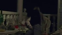 Aroused lesbians started making out on the balcony and soon they were eating each other up