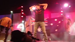 Great looking girls are dancing on the stage, in front of many guys and getting naked