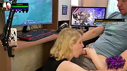 Slutty blonde babe is kneeling in front of her gamer boyfriend and sucking his dick