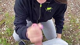 Flirty, amateur girl is sucking a horny stranger's dick in the nature, during the day