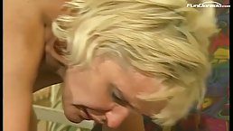 Mature blonde woman is having casual sex with a younger neighbor, in the middle of the day