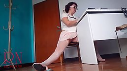Mature brunette is using an opportunity to masturbate while no one is watching her in action