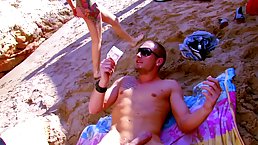 Slutty blonde in a satin shirt is sucking dick and having anal sex on the beach