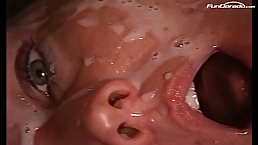 Masked brunette with big tits is sharing a rock hard dick with another slutty woman