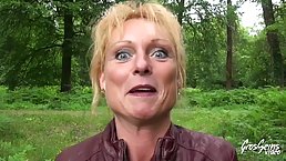 Mature blonde woman, Mendy is having casual sex in the nature, with a group of horny guys