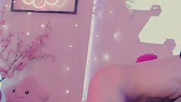 Tattooed blonde babe with pink hair is sucking a sex toy while getting fucked from the back
