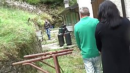 Busty Italian woman, Pamela De Boni is about to suck two rock hard cocks, for free