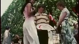 Frisky brunette is sharing a rock hard dick with another lady and moaning while getting fucked
