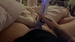 Tattooed girl is moaning while toying her pussy with a vibrator, because it feels so fucking good
