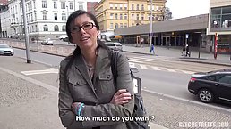 Amateur brunette is giving a blowjob to a stranger and getting fucked in a public place