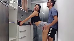 Beautiful brunette is getting fucked from the back, in the kitchen and enjoying it a lot