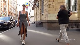 Busty brunette, Lada is going arounf the city and displaying her pussy for everyone to see