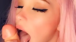 Belle Delphine is a sweet, pink haired babe who likes to suck sex toys on cam