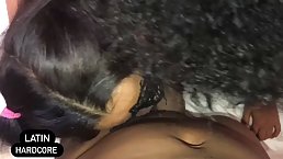 Tattooed, Latin brunette is getting spit- roasted during a threesome and enjoying every second of it