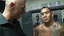 Tattooed Asian guy is fucking a smoking hot, Ebony babe with curly hair, in the ring
