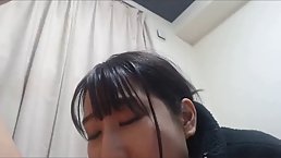 Japanese brunette with small tits is moaning from pleasure while getting fingered in her bedroom
