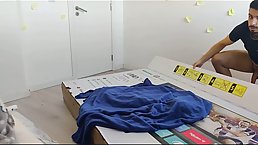 Chubby woman is sucking and riding a rock hard dick through a hole in the box
