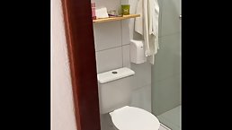Naughty Brasilian woman is having a shower in front of the camera, because it feels exciting