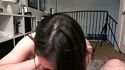 Small titted brunette, Mariah is kneeling in front of her lover and eagerly sucking his dick