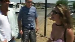 Naughty girl is getting assfucked by a group of men in the middle of the day