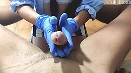 Naughty doctor is giving a handjob to one of her patients, to make him cum