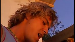 Horny woman is bouncing up and down while riding her lover's dick in the backyard