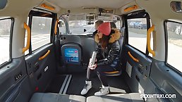 Aroused woman is sucking a rock hard dick in the back of a taxi, just for fun